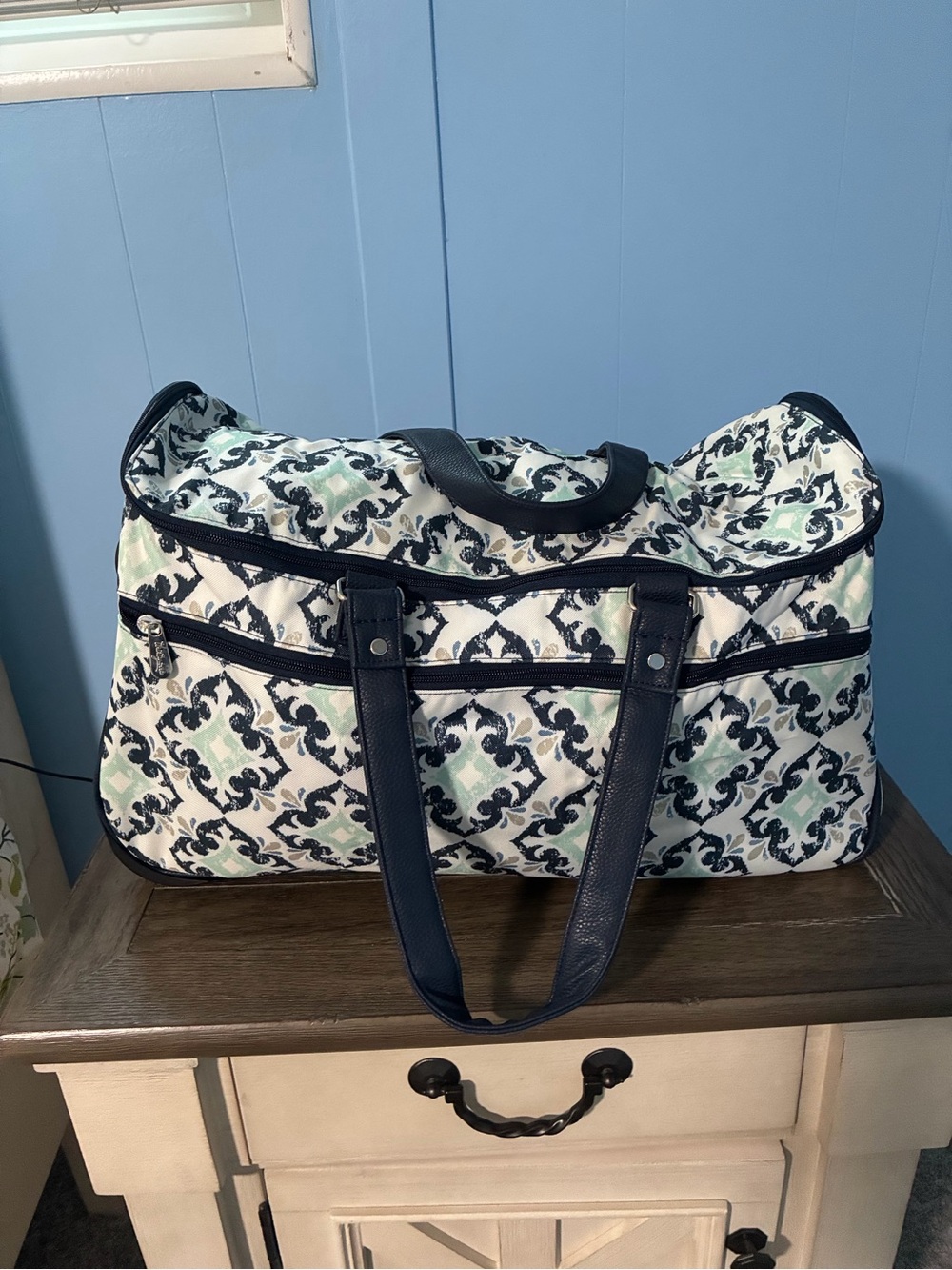 This is a two in one duffel and roller bag! The pattern is called fab and flour